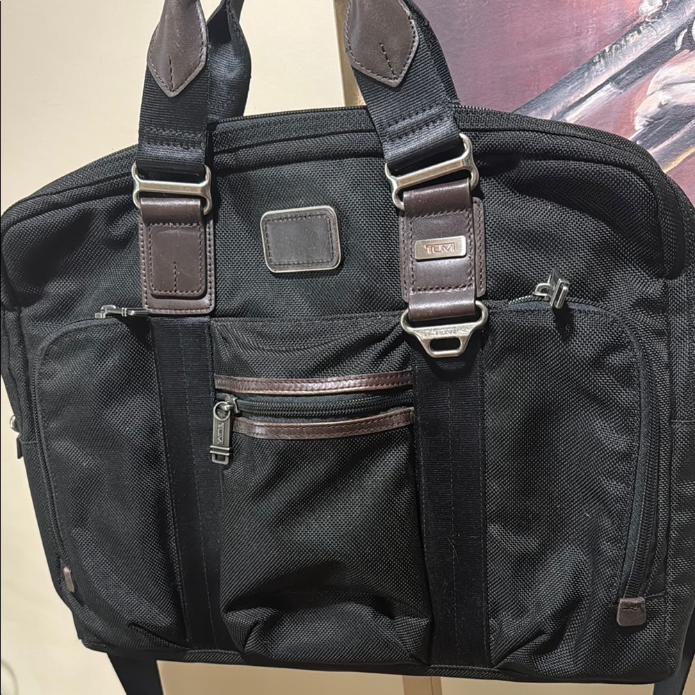 Tumi Black and Brown Briefcase with Modern Design and Durable Construction